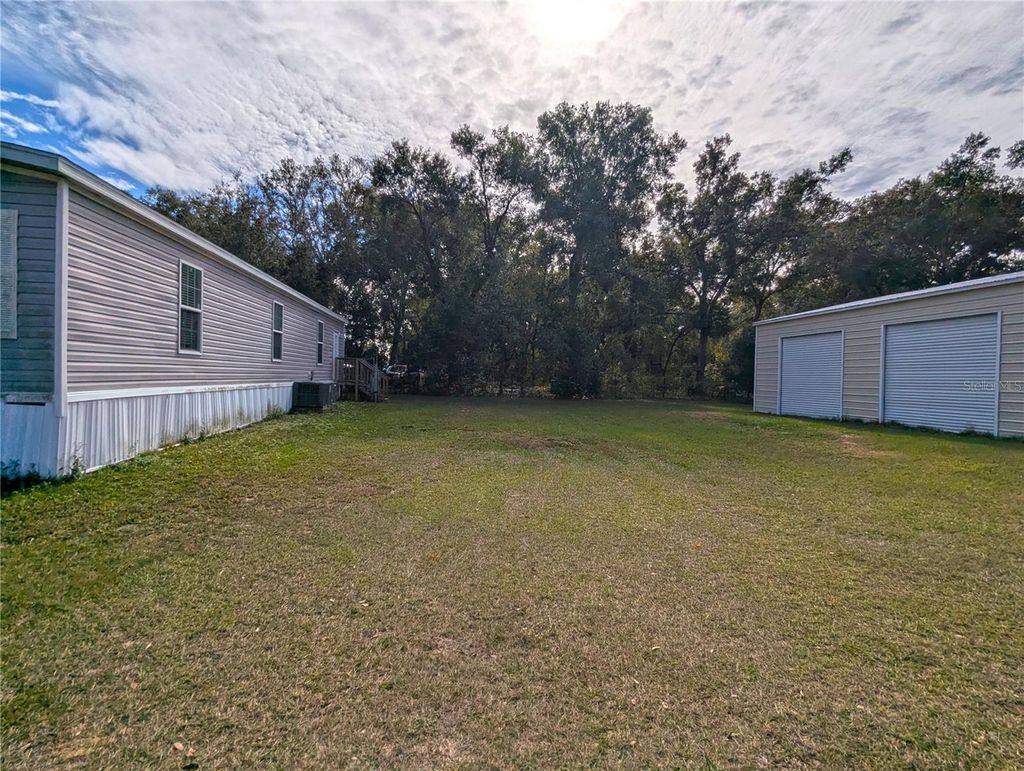 Photo of 27 Crescent Ridge Road, Davenport, FL 33837 (MLS # O6364284)