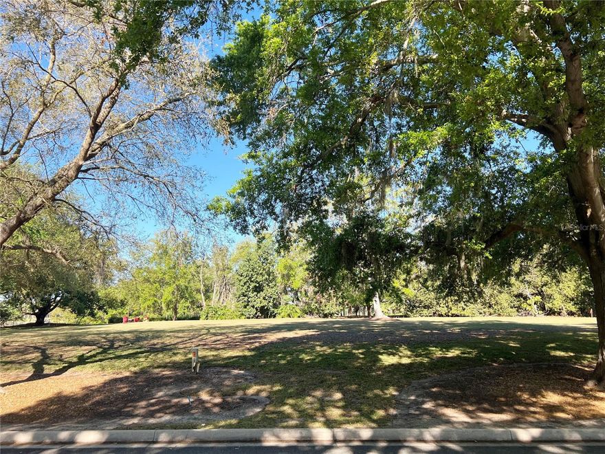 One of only two vacant lots remaining along Isleworth’s main corridor of Isleworth Country Club Drive, this 0.73-acre home site offers an exceptional setting with views of the 8th tee and beautiful Lake Bessie. Centrally located and convenient to both the main gate and Isleworth’s renowned Club and amenities, the lot presents a rare opportunity build a custom home between both the lake and Isleworth’s famed championship golf course.