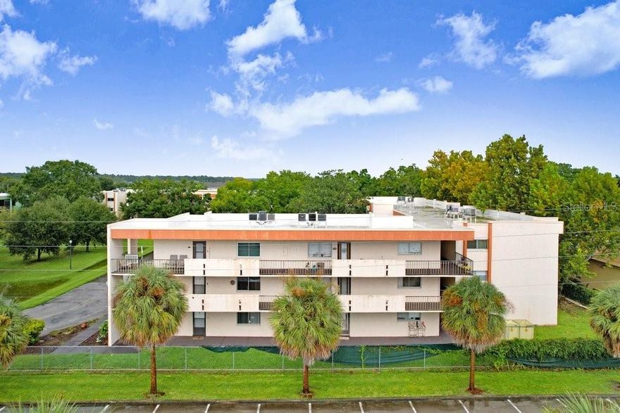 Delightful, move-in ready, 1 bedroom 1.5 bath condo near the heart of downtown Lakeland may be the home you’ve been dreaming of!  Whether you’re looking to buy your first home, downsize, or simply minimize maintenance, this gem could be the perfect choice. This beautifully maintained unit has lovely updated flooring and a newer A/C (2022), lots of windows, and a sizable porch.  The open floor plan provides comfort, functionality and style.  The spacious living room flows into dining area.  The bedroom suite is on the left and the kitchen to the right, with a shared counter that can accommodating  seating.   To the rear, sliding glass doors lead to a lovely patio.  Through the well-appointed kitchen, with new faucet and ample  cabinet and pantry storage, is a laundry room with washer and dryer. The spacious bedroom, with a large walk-in closet and en-suite on one side, and sliding glass doors leading to the porch on the other, creates a relaxing retreat space. A extra half bath proves convenient for guests. Many amenities are found within the serene setting: a community pool, tennis courts, a dock with lake views, and a clubhouse. The location affords convenient access to Lakeland’s countless benefits and charms: high quality medical services, Tigers spring training games, beautiful lakes, parks, and gardens.  The vibrant downtown features shopping, restaurants and entertainment, plus a growing, nationally accredited museum, brings culture and community connection.  Easy access to Tampa and Orlando via I-4 gives lots of options for adventure - beaches, theme parks, concerts, plus two airports offering quick getaways. Schedule Your Showing Today and make this charming home your very own!