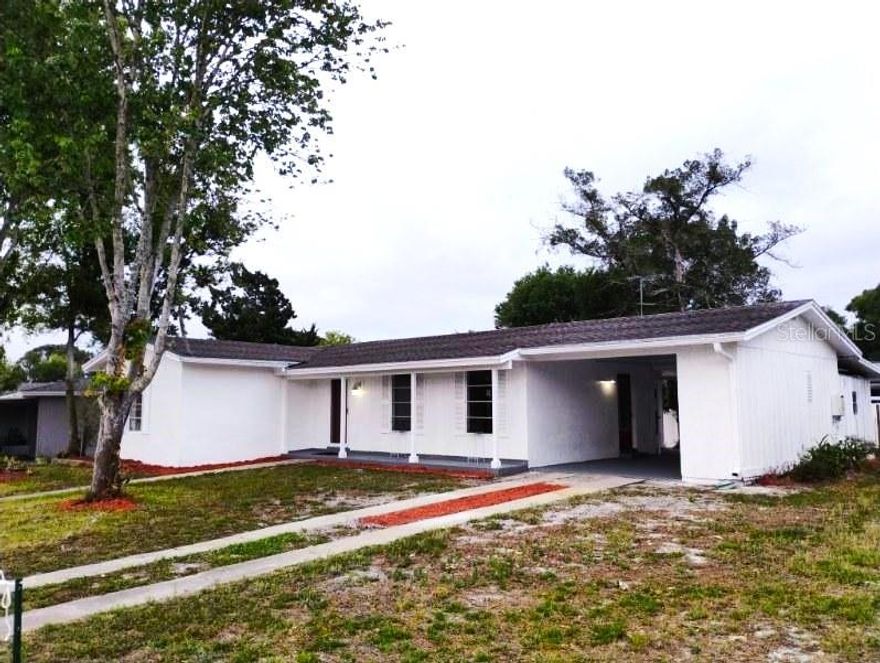 SOLID Block Home - 2 Bedroom 1.5 Bath, around 1200 SF of Living. Near Huge Lake. Carport, Lots of storage. Patio area. Nice lot, includes some back fencing. Central Heat and Air Conditioning. Good sized bedrooms. Large Florida Room. Washer/Dryer Hookups. Separate workshop. Sizes Approximate. Rents in area around $1500.00 per month.