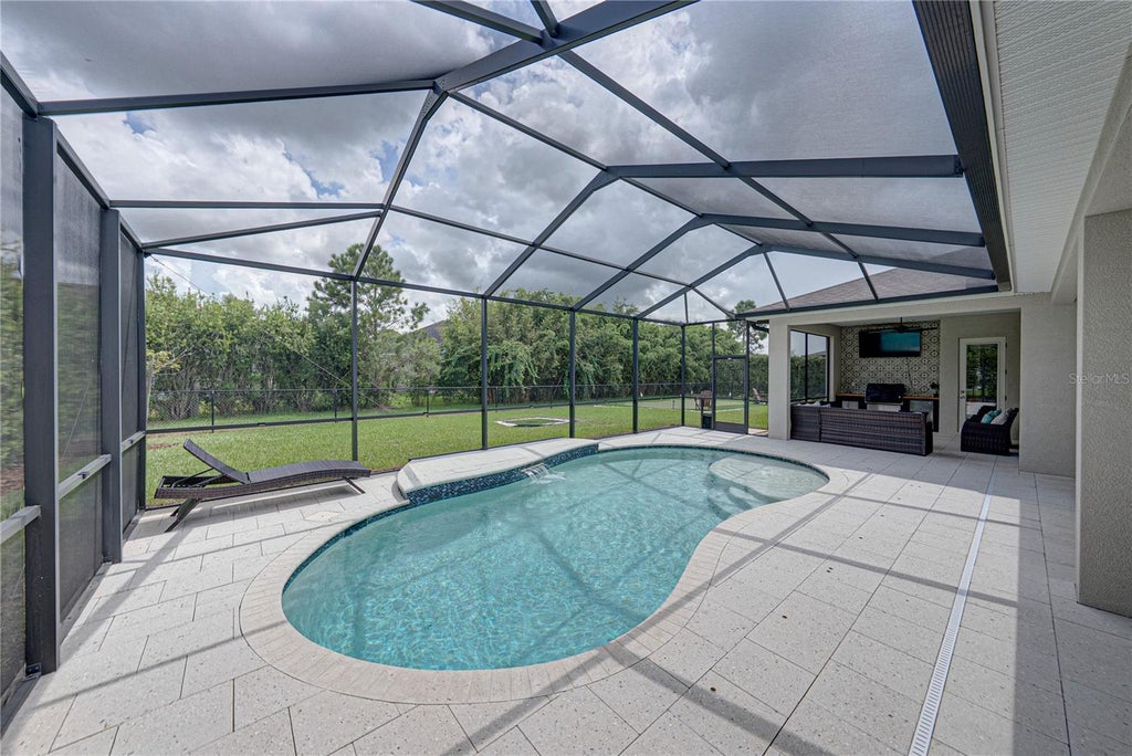 Photo of 6530 Emerald Woods Lane, Lakeland, FL 33813 (MLS # L4965757)