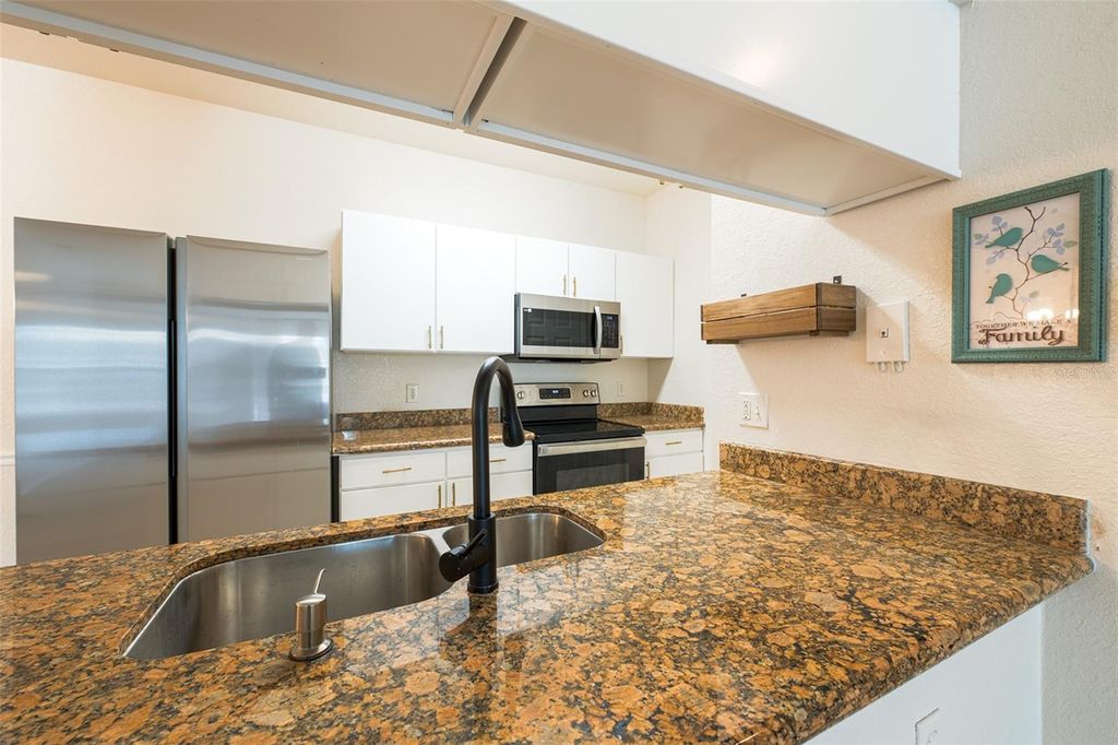 Photo of 16431 Enclave Village Drive #16431, Tampa, FL 33647 (MLS # TB8391612)