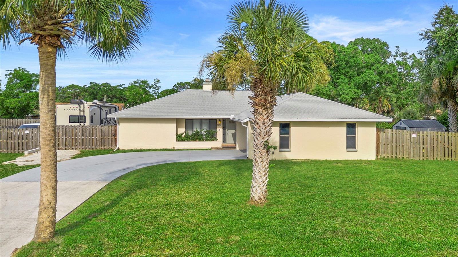 Welcome to your ideal retreat! This beautifully updated 3-bedroom, 2-bathroom home is situated on a spacious lot with no HOA, providing you with ultimate privacy and plenty of room for your RV and recreational toys. Take a dip in your fenced-in private pool, enjoy the freshly painted guest bathroom and bedroom, and unwind in the luxurious master suite complete with a modern shower. Key features include a brand new air scrubber for the AC, an RV gate with parking spot, a new variable speed pool pump, a cozy fireplace, and permanent Govee light for seasonal celebrations. Perfectly located just 15 minutes from Melbourne Beach and 5 minutes from shopping centers, this home offers both tranquility and convenience. All appliances, including the washer and dryer, as well as a brand new water filtration system, are included. Don’t miss out on this amazing opportunity—schedule your showing today! It’s rare to find such a beautiful, spacious backyard in a peaceful Florida neighborhood.
