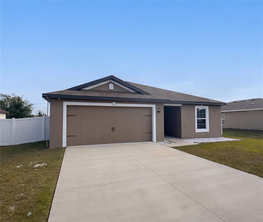 Photo of 313 Camellia Court, Poinciana, FL 34759 (MLS # O6404393)