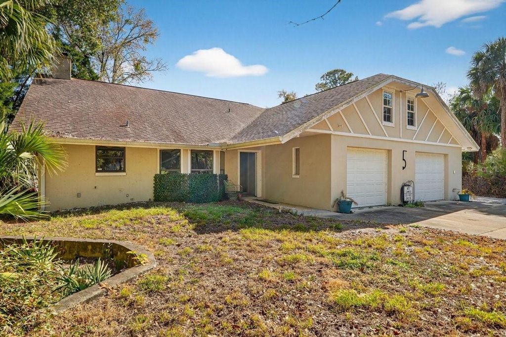 Photo of 5 Village Drive, Ormond Beach, FL 32174 (MLS # V4947367)