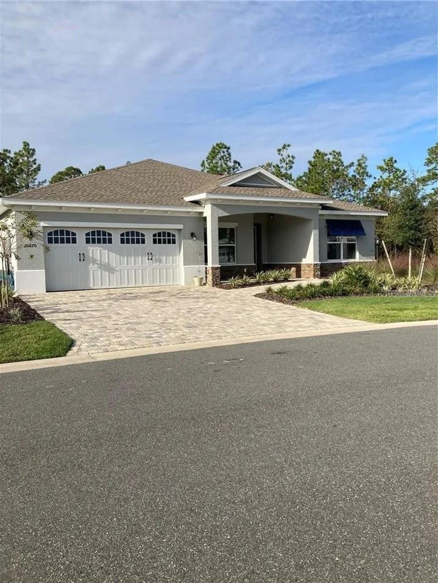 Unfurnished home for rent in Windsor, On Top of the World. This Yvette floor plan offers 2 bedrooms plus a flex room, 2 bathrooms, and a 2-car garage, with crown molding and upgrades throughout. The front of the home features a private guest suite with carpet, closet space, and an upgraded bathroom with a quartz vanity and tiled shower with glass enclosure. The flex room is ideal for a home office or hobby room and opens to the main living area. The open layout flows to the screened, L-shaped lanai, perfect for relaxing or entertaining. The kitchen includes granite countertops, staggered espresso cabinets, a built-in wall oven, drawer microwave, a large island, and a dining nook with a picture window overlooking the backyard. The spacious primary suite offers a ceiling fan, dual quartz vanities, a walk-in tiled shower with bench seating, and a large walk-in closet. Enjoy Florida living year-round and take advantage of the included community amenities. Minimum 1-year lease at $2,000 per month plus utilities. Dog friendly. (Property ID 086WIN)