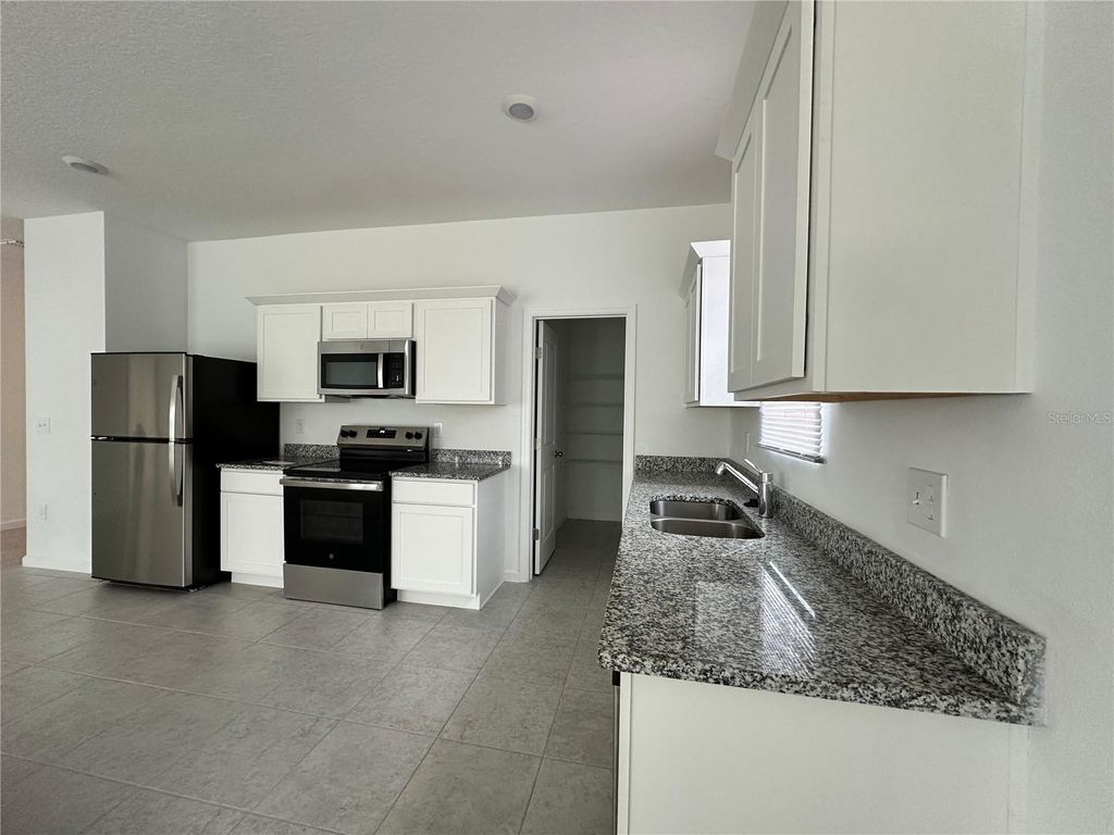 Photo of 545 Hennepin Loop, Lake Wales, FL 33898 (MLS # S5136019)