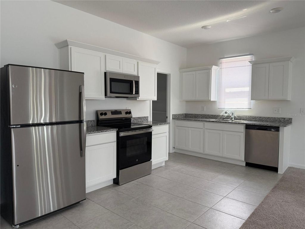 Photo of 545 Hennepin Loop, Lake Wales, FL 33898 (MLS # S5136019)