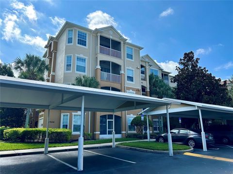 Photo of 6466 Cava Alta Drive #404, Orlando, FL 32835 (MLS # O6383543)