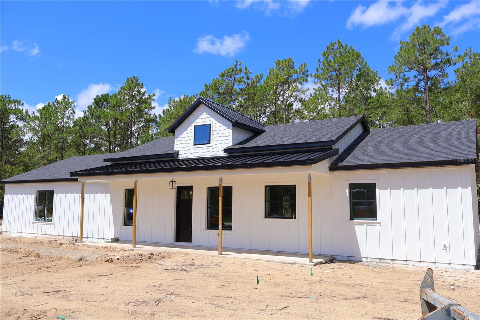 Welcome to your dream farmhouse retreat! This beautifully crafted 3-bedroom, 2-bath home sits on just under an acre of land with no HOA and paved road access, offering the perfect blend of modern convenience and country charm.
Step inside to find tile flooring throughout—no carpet here—making maintenance a breeze. The spacious open-concept layout features a bright kitchen with quartz countertops, stainless steel appliances, and ample cabinetry, ideal for both everyday living and entertaining.
The split floor plan offers privacy for the primary suite, complete with a spa-inspired bathroom and walk-in closet. Enjoy the Florida lifestyle with plenty of outdoor space, perfect for a garden, pets, or weekend bonfires under the stars.
Located just minutes from the area’s natural springs, and only about an hour to the Gulf Coast beaches, this home offers the best of both worlds—peaceful country living with easy access to recreation and relaxation. This home is 10 minutes from the World Equestrian Center and close to shops and hospitals.
With a 3-car garage, quality finishes, and room to roam, this home is ready for you to move in and make it your own!