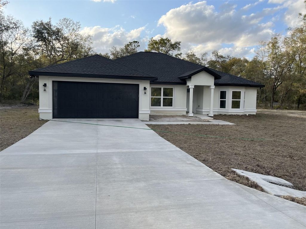 Photo of 6 Locust Terrace Trace, Ocala, FL 34472 (MLS # OM717577)