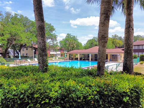 Tiny photo for 504 Silver Course #A, Ocala, FL 34472 (MLS # OM725732)
