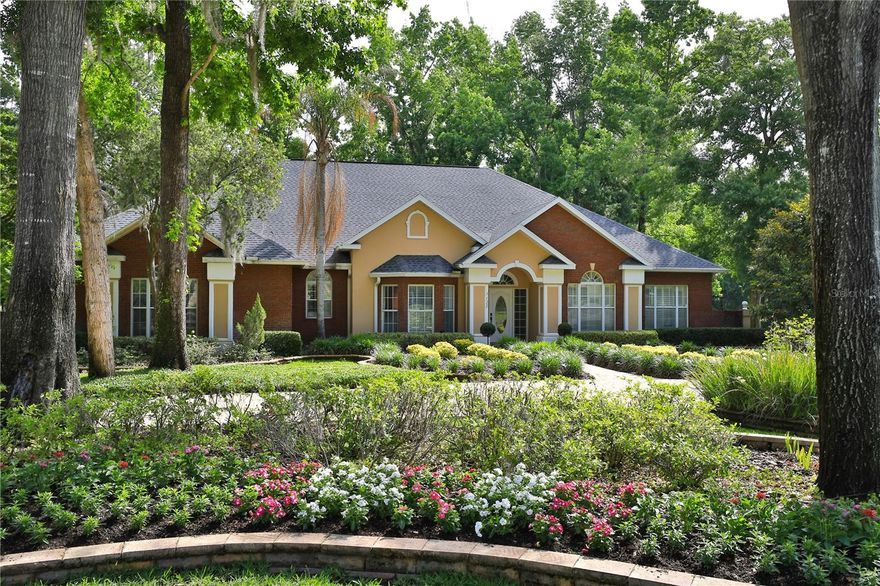 Elegant Living in the Country Club of Ocala

Located within the Country Club of Ocala, this beautifully maintained residence offers timeless elegance, spacious living, and exceptional indoor-outdoor entertaining. Featuring 4 bedrooms, 2 full bathrooms, and 2 half baths, the thoughtfully designed floor plan also includes a spacious bonus room ideal for a media room, game room, home office, or additional gathering space.

From the moment you arrive, the home’s mature landscaping, inviting curb appeal, and stately architectural details create a warm and welcoming first impression. Inside, rich finishes, tray ceilings, crown molding, and abundant natural light enhance the home’s refined yet comfortable character.

The spacious kitchen is designed for both everyday living and entertaining, featuring extensive cabinetry, granite countertops, a center island, and an open flow overlooking the main living areas. The expansive living room serves as the heart of the home, showcasing soaring ceilings, a stunning floor-to-ceiling stone fireplace with custom wood accents, and seamless access to the outdoor entertaining spaces through multiple French doors.

Designed to embrace Florida living, the interior opens effortlessly to a spacious covered lanai and screened pool enclosure, creating the perfect setting for year-round enjoyment. Beyond the pool area, a beautifully designed fire pit area provides an inviting space to relax and entertain guests while enjoying the peaceful surroundings.

The owner’s suite offers a relaxing private retreat with generous proportions and a luxurious bathroom featuring dual vanities, a soaking tub, and a walk-in shower. Additional bedrooms are thoughtfully positioned for comfort and privacy.

Situated within one of Ocala’s most sought-after gated golf communities, this exceptional home offers a wonderful blend of elegance, comfort, and entertaining. All conveniently located near shopping, dining, golf, and everything Ocala has to offer.