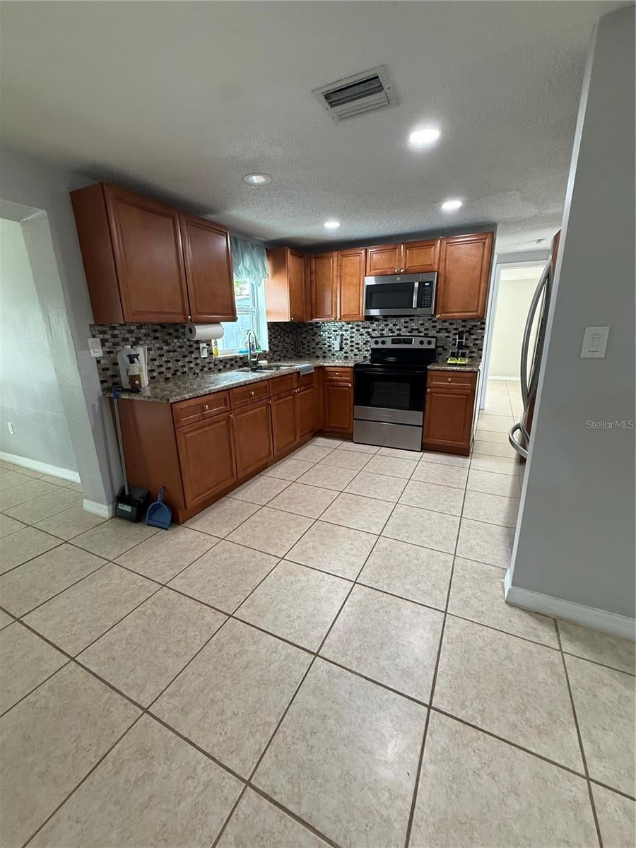Photo of 7325 Ivanhoe Drive, Port Richey, FL 34668 (MLS # TB8552971)