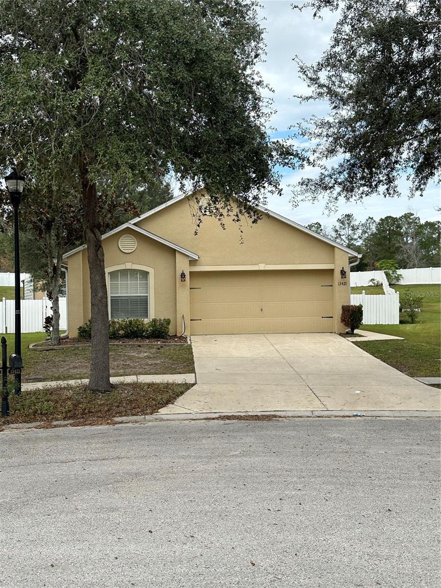 Enjoy the ease of location, near schools, parks and entertainment while being on the largest lot in the community, over 1/2 of an acre.  A beautiful 3 bedroom, 2 bath home, fenced yard for the enjoyment of all, including our furry friends.  Freshly painted, and new upgrades including New water softener,  washer and dryer. Stainless steel appliances in the kitchen. Plantation shutters, and a beautiful breakfast bar with solid wood countertop. Large Shed in the backyard for the toys.  Garage has a screened enclosure plus the normal garage door, so many areas to enjoy the fresh air.