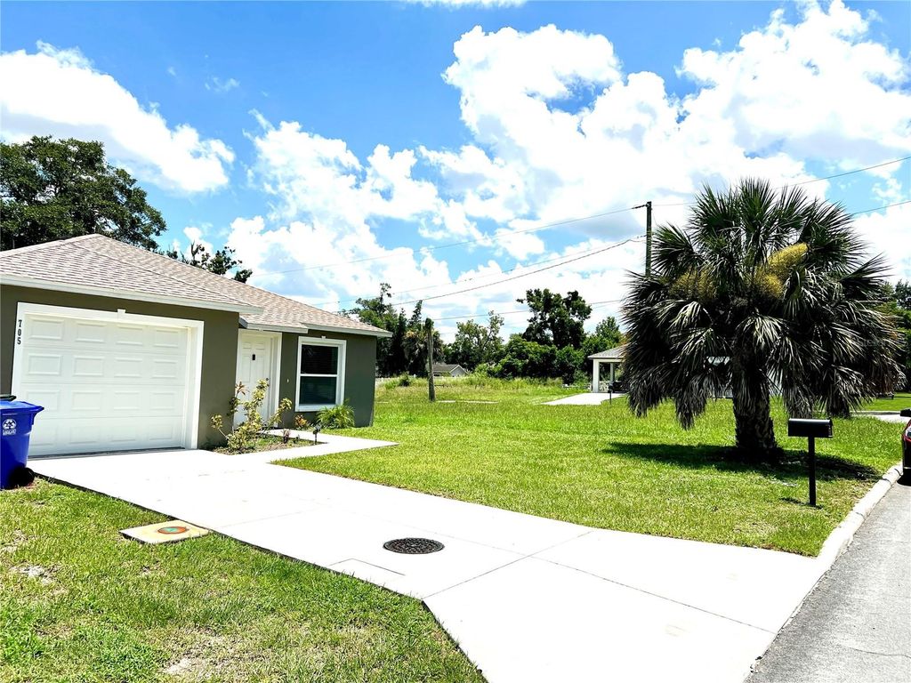 Photo of 705 Gilmore Avenue, Lakeland, FL 33801 (MLS # TB8486058)