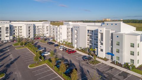Photo of 4731 Clock Tower Drive #206, Kissimmee, FL 34746 (MLS # S5119537) Photo of 4731 Clock Tower Drive #206, Kissimmee, FL 34746 (MLS # S5119537)