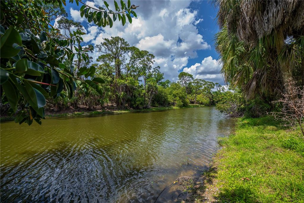 Photo of 1609 Harmony Drive, Port Charlotte, FL 33952 (MLS # C7524217)