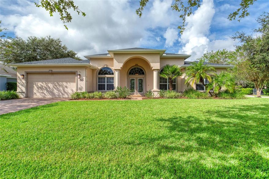 Tucked away in the beautiful community of Ormond Lakes, this lakefront pool home is the perfect mix of comfort, style, and everyday practicality. With 4 bedrooms, 3 baths, and a 2-car garage, it has the space you need, plus all the upgrades you'll love including a freshly sealed driveway that adds to the home's curb appeal right from the start. Roof 2022 / AC 2015 / HWH 2020. From the moment you step inside, you'll feel how open and inviting this home is. Over 11-foot ceilings, fresh interior paint, and upgraded lighting fixtures create a bright, welcoming atmosphere. The heart of the home is the newly renovated kitchen completely redone for the pickiest of buyers. You'll find sleek quartz countertops, stainless steel appliances, and plenty of cabinet space. The kitchen flows easily into the living and dining areas, making it ideal for gatherings and everyday living. There's also a bonus room that works perfectly as an office, playroom, or flex space. The primary suite is designed for relaxation, with a spa-like bathroom featuring his-and-her vanities, a soaking tub, a walk-in shower, and two spacious walk-in closets. One of the closets is reinforced to double as a safe room. Engineered wood flooring runs throughout much of the home, tying everything together with a warm, classic feel.

Step outside and you'll see why this home is truly special. The 2013 saltwater pool sparkles under the Florida sun, surrounded by travertine decking that's been freshly sealed. Enjoy peace of mind with a Brand New 2025 Pool Heater, 2025 Salt Cell, and 2025 Jandy AquaLink Remote to enable pool control at your finger tips. The lanai is perfect for relaxing or entertaining, and it comes equipped with a full-length electric hurricane shutter that spans the entire patio, protecting the home at the push of a button. Beyond the pool, the peaceful lake views and mature landscaping create a private backyard oasis. The pool equipment updates, along with a newer roof (just 3 years old), you can enjoy your dream home worry-free.

Practical touches like all the toilets outfitted with bidets, a generator hook-up and a mounted A/C wall unit in the garage make everyday life easier. And when you live in Ormond Lakes, you're not just buying a home, you're joining a community. Ormond Lakes features several miles of walking and biking sidewalks, newly updated clubhouse, tennis, fishing pier, community pool, easy access to I-95, and is located several minutes from Tomoka State Park. Square footage from tax rolls. All info intended to be accurate but can't be guaranteed.