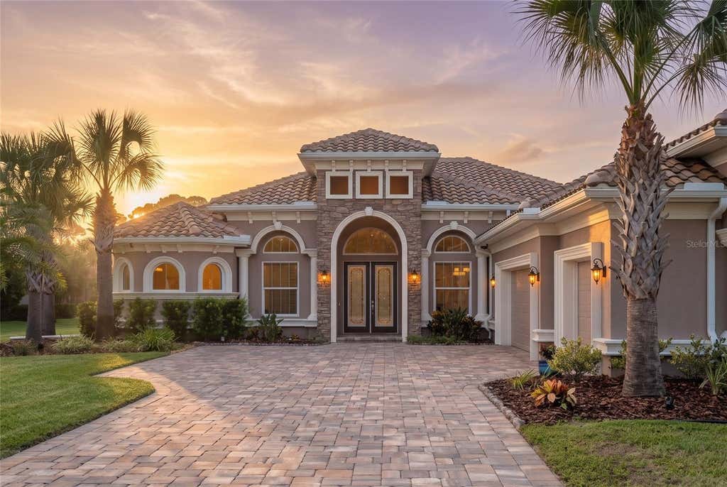 Photo of 206 Willow Oak Way, Palm Coast, FL 32137 (MLS # FC320409)