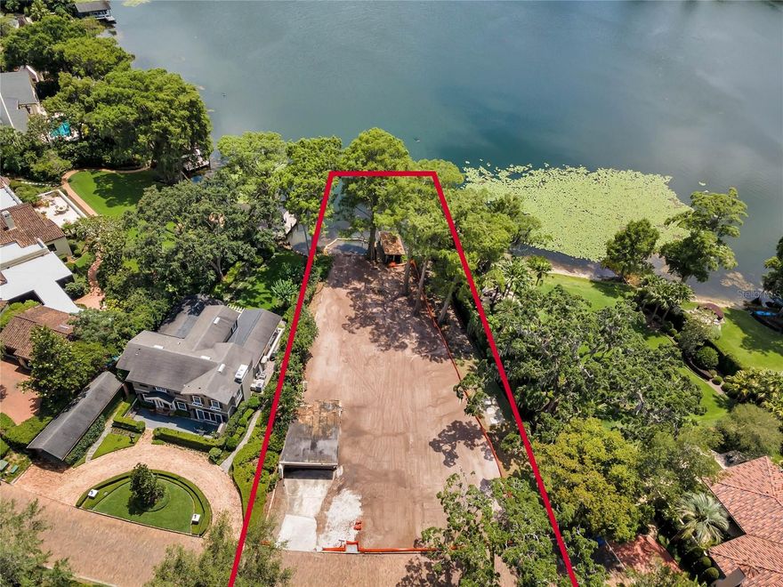 Beautiful and secluded lakefront lot on quiet cove on Lake Osceola.  Opportunity to design and Build with Z Properties.