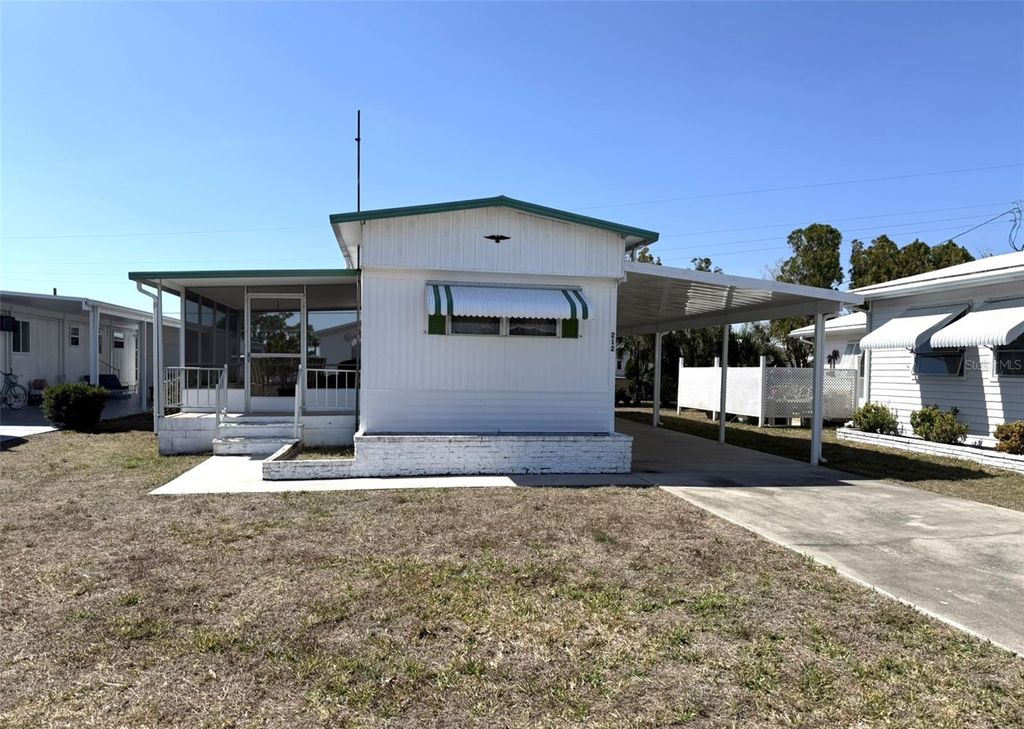 Photo of 212 Wolverine Avenue, North Port, FL 34287 (MLS # N6143098)