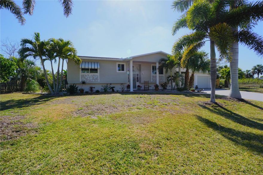 Discover this charming waterfront home located in the heart of Punta Gorda, Florida! Light and bright layout with two bedrooms and two bathrooms that are also ensuites for couples who like their own space, or for hosting visitors. The primary bedroom has a large walk in closet and a private bathroom with a stand up shower. An open layout that combines the kitchen, dining and living room area makes for a great place to have friends and family over. This cottage style home reflects the 'coastal' ambiance of old Florida and you can relax in the spacious heated and air conditioned Florida room that measures in at 11 x 30. This Florida room has floor to ceiling views of the waterfront that leads to Charlotte Harbor. Minimum restrictions in this conveniently located subdivision called Charlotte Park that makes it possible to store your RV, and the oversized 2 car garage that measures in at 24 x 29 has plenty of room for vehicles and 'toys'. House has older but sizeable fishing dock eliciting memories of 'Flipper', and a working boat lift if you dream of boating in Florida! Wider hallways and doorways, plus lower light switches make this one a good choice for someone in a mobility chair.  This home is being sold fully furnished, and with a 2 year transferrable FEMA flood policy. Location of this home is key for that lifestyle that you may be looking for as a Publix Shopping Center, a Home Depot and a Walmart are all just minutes away.  Downtown Punta Gorda is also just minutes away with all it has to enjoy like a miles long walking and biking trail that runs along the Charlotte Harbor. Multiple places to put the boat or wave runner in the water. Different types of restaurants from fine dining to your favorite pub or sports bar.  8 different golf courses within a 20 minute drive for all you golfing enthusiasts.  Pickleball has become a favorite activity as well and this town has plenty of courts and leagues all over including the large Pickle plex just minutes away. Plenty of historical sites to see as you browse around town and of course some of our standard favorites like the annual Christmas Tree lighting downtown, Halloween and the Saturday morning farmers market.  So hurry now to schedule your showing and prepare to enjoy your next phase in life.
