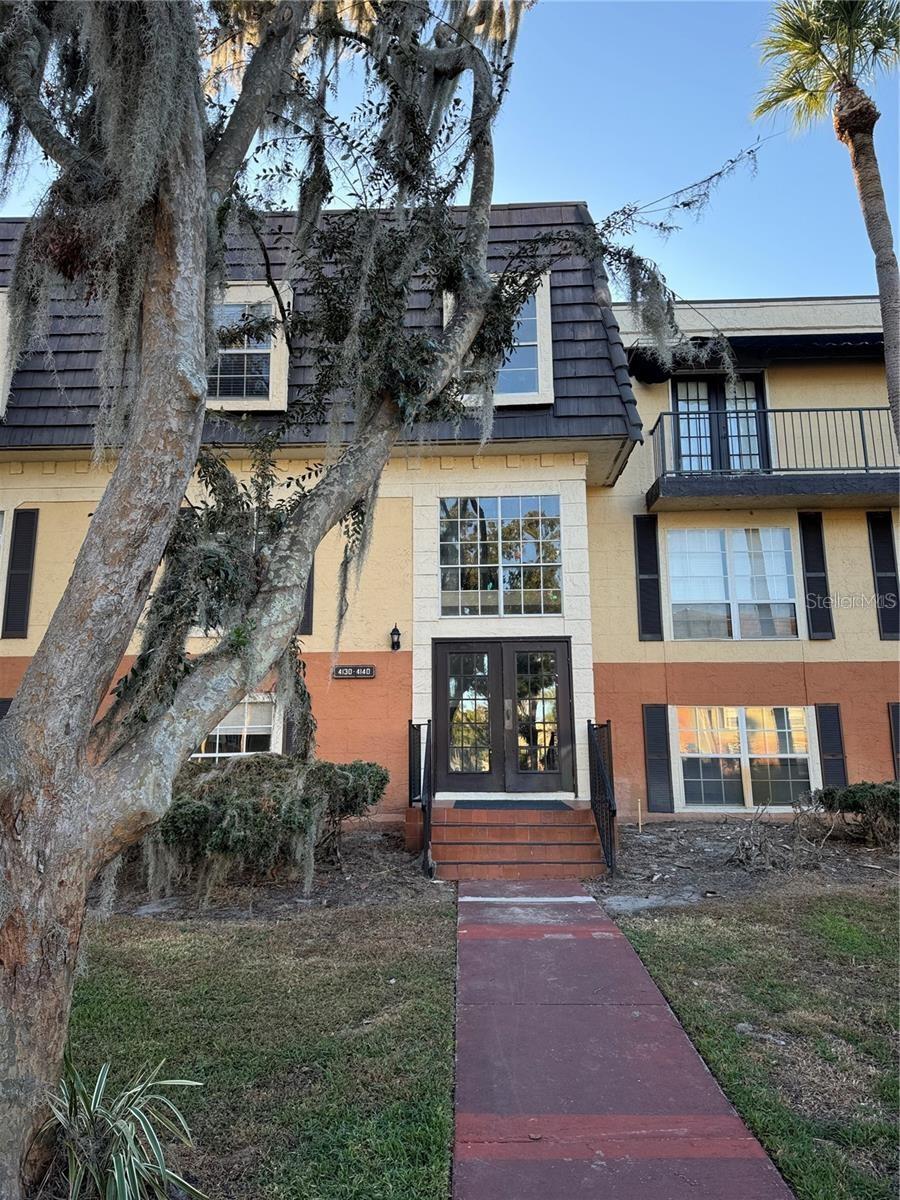 Photo of 4136 Versailles Drive #4136D, Orlando, FL 32808 (MLS # O6452614)