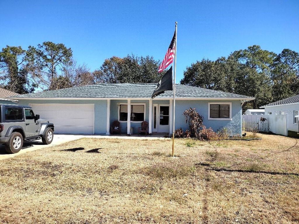 Photo of 18 Palmyra Lane, Palm Coast, FL 32164 (MLS # FC316086)