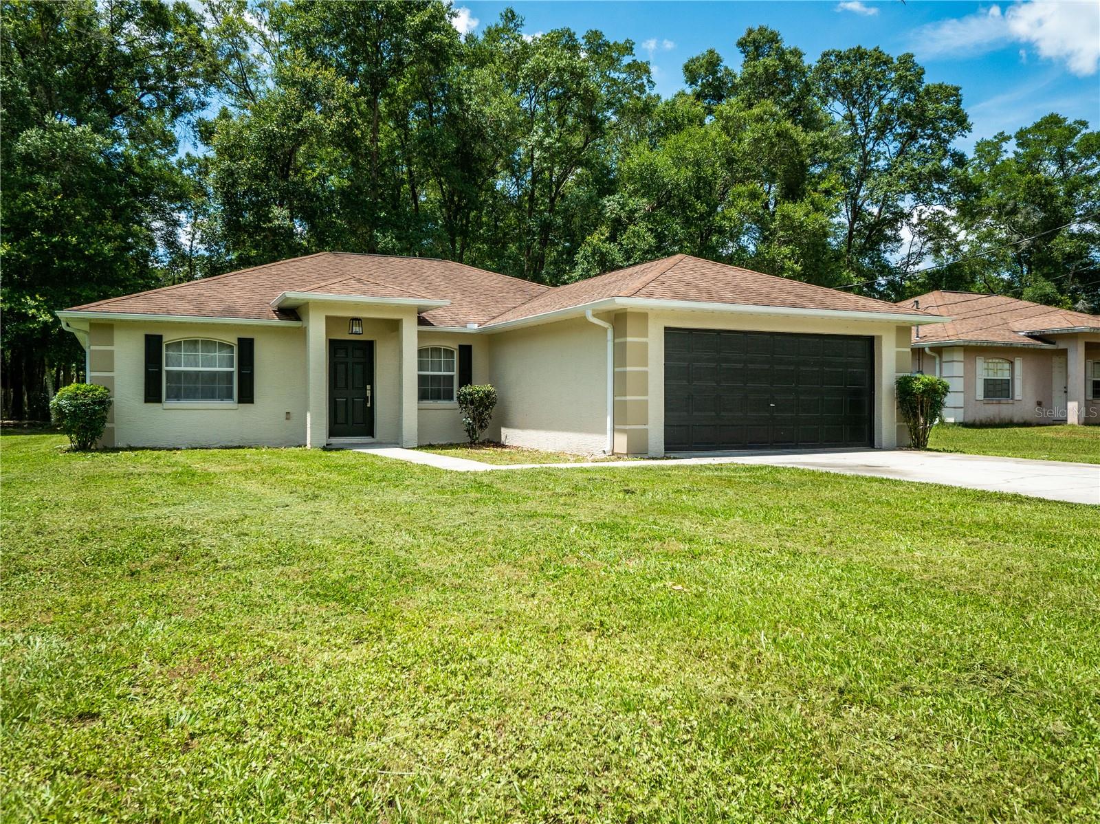 Our charming 3-bedroom single story nestled amid the serene suburbs of northern Ocala. This picturesque urban retreat is perfect for those who want to relax and experience an elevated lifestyle. Inside the house, an impressive and spacious layout awaits you. 3 Bedroom 2 Bathroom, double car garage. Close to the World Equestrian Center, Shopping and restaurants. Currently used as an Airbnb, fully furnished.