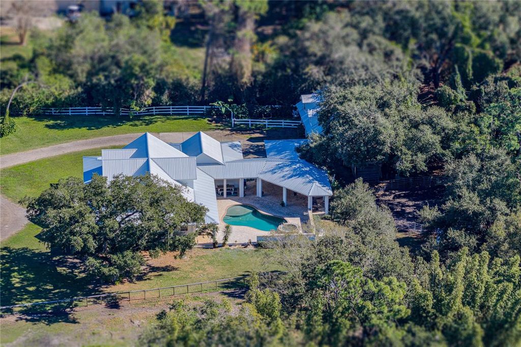 Photo of 209 Frenchmans Creek Way, Winter Haven, FL 33884 (MLS # L4958708)