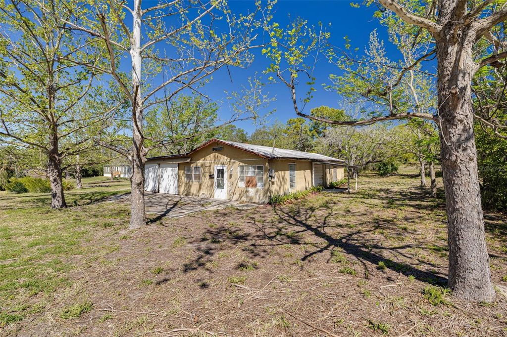 Photo of 10617 Denton Avenue, Hudson, FL 34667 (MLS # TB8449977)