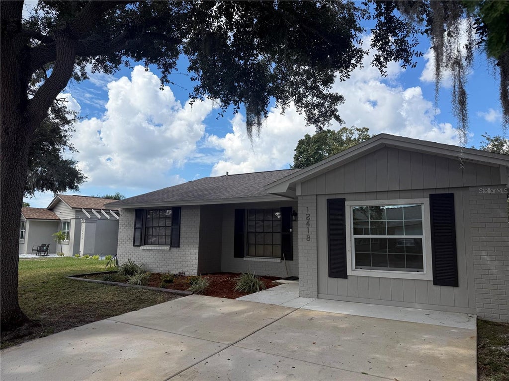 Photo of 12418 Queensland Lane, Tampa, FL 33625 (MLS # TB8553480)