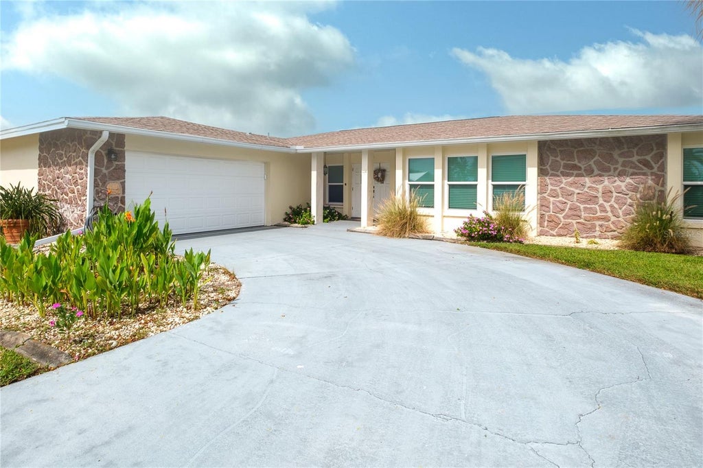 Photo of 114 Caddy Road, Rotonda West, FL 33947 (MLS # N6145994)