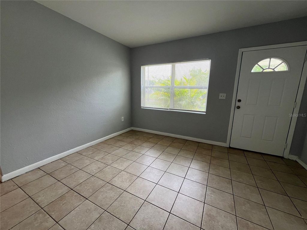 Photo of 4203 Lake Lawne Avenue, Orlando, FL 32808 (MLS # TB8498484)