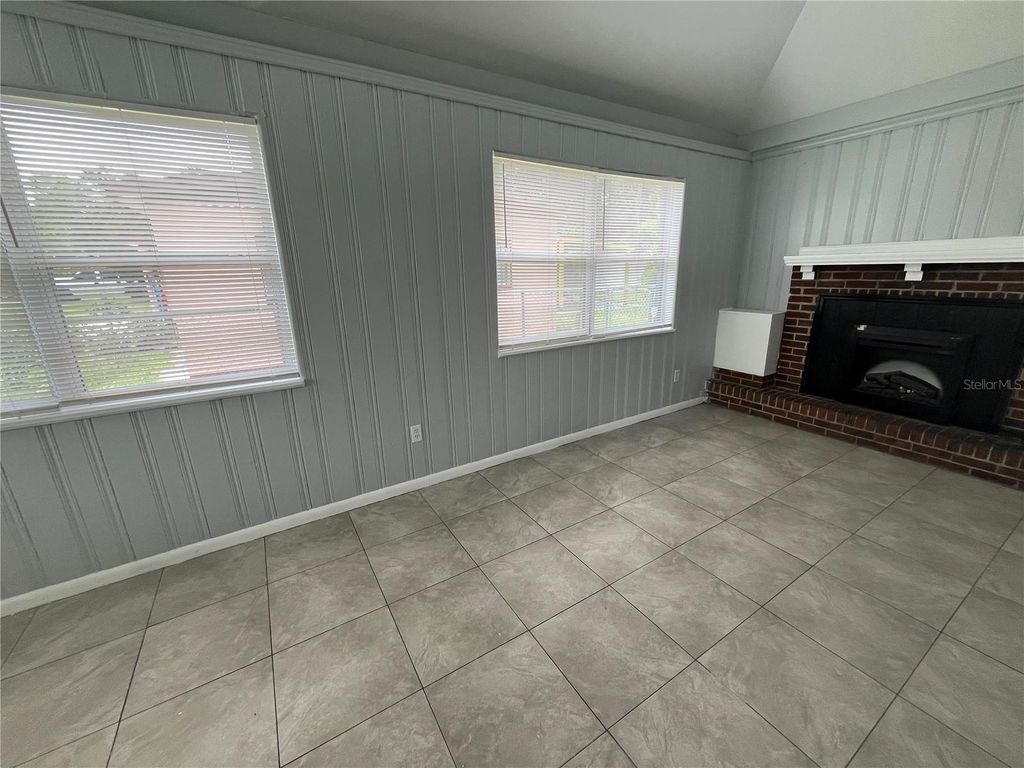 Photo of 4203 Lake Lawne Avenue, Orlando, FL 32808 (MLS # TB8498484)