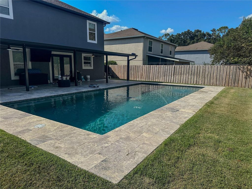 Photo of 713 SW 242nd Terrace, Newberry, FL 32669 (MLS # GC534607)