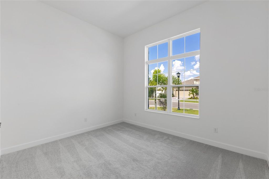 Photo of 5975 Blakeney Loop, Apollo Beach, FL 33572 (MLS # O6252365)