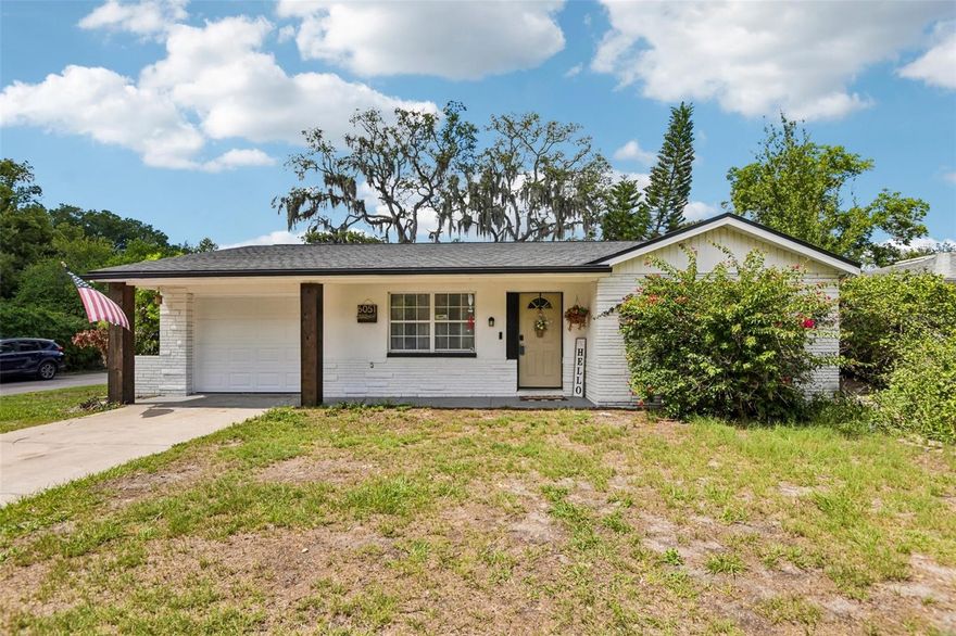 One or more photo(s) has been virtually staged. Welcome to your move-in-ready home in the heart of New Port Richey, located at 6051 Tennessee Avenue. This nicely renovated gem is built with solid concrete block construction and sits prominently on a spacious corner lot, offering great modern style and structural integrity. Every detail has been updated for ultimate peace of mind, including a brand-new roof (2024), a new garage door, fresh drywall, and a crisp interior paint palette that creates a bright, airy atmosphere. The home features an updated chef’s kitchen with contemporary finishes and a refreshed bathroom boasting modern fixtures and a lovely aesthetic. Beyond the interior, the layout flows seamlessly to a charming rear porch—ideal for morning coffee or enjoying the Florida breeze—while the oversized lot provides ample room for gardening or play. Situated just minutes from the vibrant shopping, dining, and riverfront parks of downtown, this terrific property is a standout choice for anyone. Don’t wait—schedule your private showing today and make this renovated beauty your own!