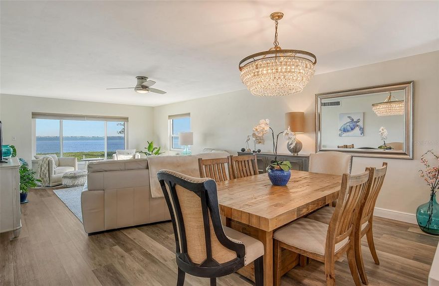SELLER SAYS “SELL!” Unbeatable opportunity at $689,900 for a full Bayfront Waterview, corner end-unit on Longboat Key. Exceptionally priced below market value—this residence represents the lowest-priced Bayfront end unit listing since December 30, 2021, in the highly desirable community of Windward Bay. A compelling price point, providing rare access for those seeking to own a premium waterfront residence at an extraordinary price. Encompassing 1,523 square feet, this stylishly furnished, two-bedroom, two-bath residence is thoughtfully designed to showcase uninterrupted panoramic Bay views from every room. Natural light fills the open living and dining areas, where expansive windows frame ever-changing Bay views from sunrise through the evening’s sunset. The remodeled 2024 kitchen opens seamlessly to the main living area and features recently completed upper cabinetry and a sophisticated yet functional layout ideal for both relaxed daily living and entertaining. Recently acquired “chic” French doors in both bedrooms open to the Florida Room, a signature feature for Longboat Key residences, offering additional living space to enjoy morning light and serene Bay vistas. The spacious primary suite includes a private en-suite bath and a generous walk-in closet, providing comfort, supporting everyday living, and abundant storage. “Pet Friendly” Windward Bay is a well-established waterfront community known for its mature landscaping, waterfront setting, resort-style amenities, a strong proactive association with solid reserves, and an enduring reputation as one of Longboat Key’s most welcoming communities. (Attributes that continue to attract owners who value lifestyle as much as long-term stability.) The Milestone Inspection and Capital Reserve Study are complete. Windward Bay’s Monthly Condo Fees for 2025 were actually reduced and for 2026 only increased slightly by $13 a month, demonstrating a financially healthy Condo Association. Offered furnished and move-in ready, this corner end-unit provides flexibility as a full-time residence, seasonal retreat, or investment opportunity. From dolphins at dawn to sunsets on the Gulf—every day is paradise. Community Highlights: Enjoy three beach access points (including one private), 26 acres of lush tropical surroundings including ½ mile of nature trails, two heated pools for year-round enjoyment, fitness center and sauna, clubhouse for social gatherings, tennis and pickleball courts, boat docks (waitlist) and kayak launches for water enthusiasts, covered parking and storage. With convenient access to Downtown Sarasota, St. Armands Circle, Bridge Street, championship golf courses, renowned restaurants, shopping destinations, and vibrant cultural attractions, you'll never have a shortage of entertainment options. An uncommon offering distinguished by exceptional value, location, and the timeless appeal of gulf to bay living. Private showings are available for those seeking a rare chance to own a premium waterfront residence at an extraordinary price.