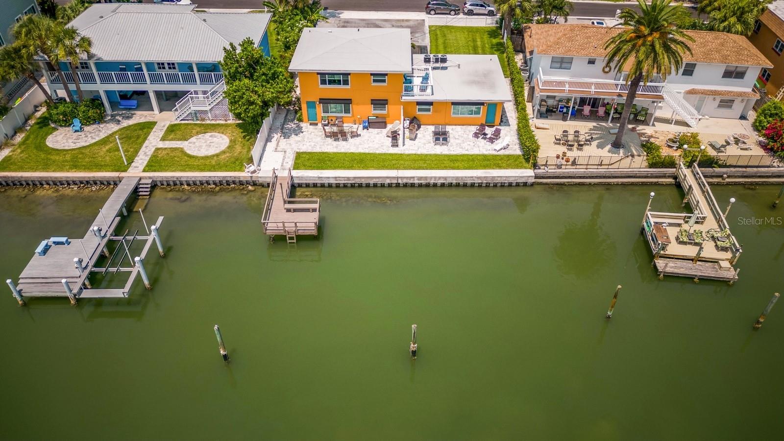 ** Seller Financing Opportunity...Seller will hold 500K note at 7%**Perfect opportunity to purchase a waterfront, 3 unit (6 bedroom) vacation rental building in the highly sought after city of Indian Rocks Beach. CONCRETE BLOCK CONSTRUCTION - ALL NEW HURRICANE - NEW MARINE SEAWALL - ALL NEW ROOF - WATERFRONT VACATION RENTAL PROPERTY. Turn-key and ready for Vacation Rentals. Tenant occupied, annual leases all Month to Month. Indian Rocks Beach has no rental restrictions on AirBnB short terms rentals. Excellent Income property. Entire property has been renovated both interior and exterior. All new hurricane windows, new paint, awnings, pavers (front and back), car port, landscaping, sprinklers and fencing. 72 feet of new seawall and cap. Interiors of all three units (2 Beds 1 Bath) are brand new, kitchens, appliances, bathrooms, flooring, moldings and paint. All new AC units. Roof deck and dock with space for two boats. New outdoor shower, covered parking. Three separate storage units with washer and dryer in each. See attached income statement for income and expenses. All 2 Beds 1 Bath Zero deferend maintenance Fully Renovated New roof 72 Feet of Waterfront along the Intercoastal All New landscaping, sprinklers, pavers, deck, dock New seawall and cap All New hurricane windows, exterior paint, awnings. All New gutters and soffits. All New interiors, paint, flooring, kitchens, baths, molding, doors, appliances. New Hot & Cold Outdoor Shower 3 New AC units 3 Separate electric meters Unit 1 furnished by professional interior designer, ready for Airbnb, all furnishings convey. All new outdoor lighting Keyless entry on all doors. Comparable STR's in Indian Rocks Beach are showing 240K-260K in gross income. Buyer to verify comparable income.
