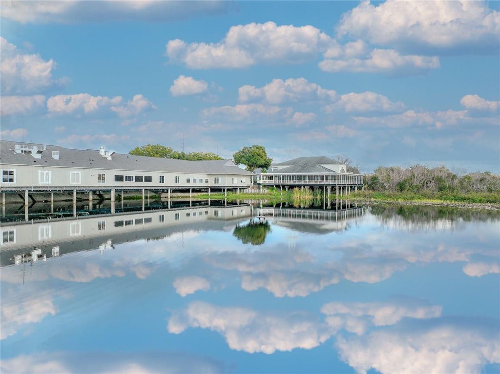 Photo of 185 N Pearl Lake Causeway #210, Altamonte Springs, FL 32714 (MLS # O6374886)