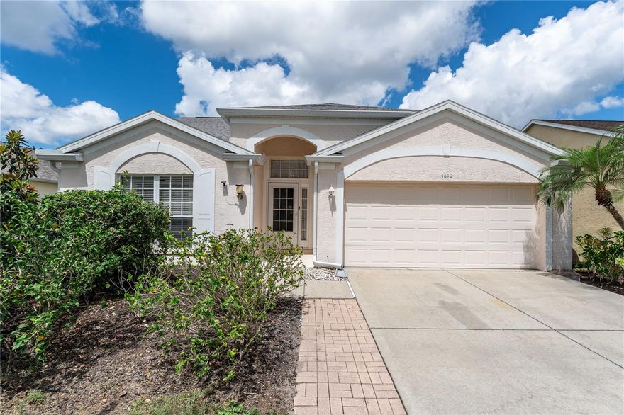 Welcome to this beautifully maintained 3 bedroom, 2 bath home nestled in the highly sought after Sabal Harbour Community centrally located between US 301 and I-75 just north of SR 70.  *** Built in 2001 and thoughtfully updated, this home offers comfort, space, and scenic surroundings at an exceptional value.  Step inside past the entryway to the open-concept L-shaped living and dining rooms, filled with natural light and enhanced by soaring cathedral ceilings.  The spacious kitchen features a breakfast bar that seamlessly connects to the living and dining spaces – perfect for everyday living and entertaining.  The large primary suite offers a peaceful retreat, complete with a walk-in closet, double vanity, walk-in shower, and private water closet.  Two additional bedrooms and a full bathroom provide plenty of room for family, guests, or a home office.  Enjoy Florida living at its best with an expansive screened lanai overlooking a tranquil pond – ideal for morning coffee or evening relaxation.  ***Key features: New roof (2022), New HVAC (2022), water heater (2022), washer and dryer bought in 2022 included, 2 car garage, spacious lanai with pond view, Low HOA fee: $69/month. *** Community amenities: Very large heated community swimming pool, flood-lit tennis and pickleball courts, basketball court, and playground *** Don’t miss this opportunity to own a move-in ready home in a quiet neighborhood with easy access to shopping, dining, schools, and Gulf beaches.  Note: entry to Sabal Harbour is off of 45th street, and is north of entrance to Sabal Key. Schedule your private showing today!