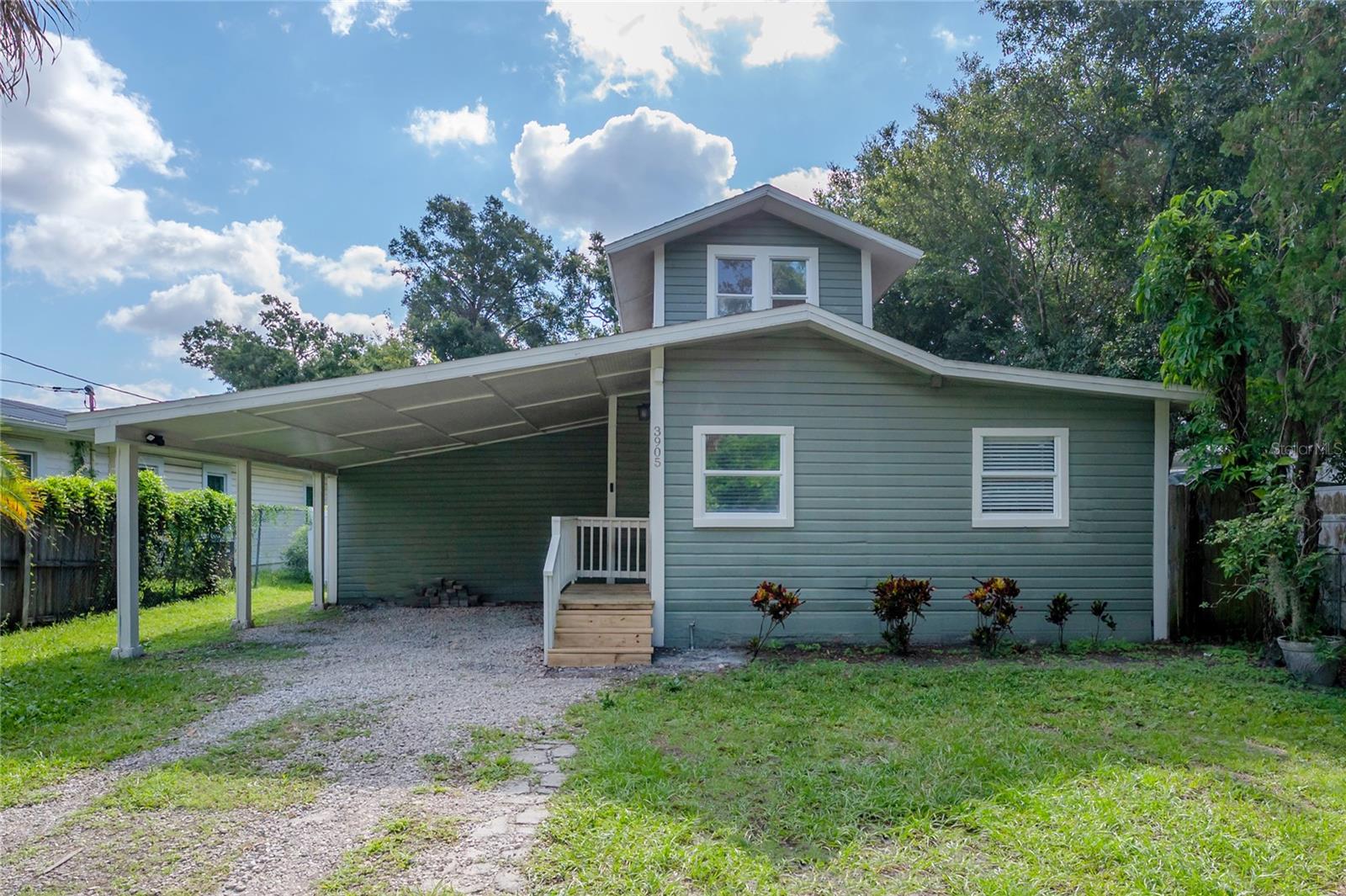 This sweet 1926 bungalow in gorgeous old Tampa Heights is priced right and ready for a new owner! Situated just 2 minutes from the beautiful Riverwalk - perfect for a relaxing bike ride down to your favorite spots to wine and dine on the river. This home shows off a BEAUTIFUL SPACIOUS KITCHEN that features a breakfast bar with designer pendant lighting, gorgeous quartz counters, marble subway backsplash, induction range, double convection oven and plenty of cabinet space including a corner lazy susan! The LOT MEASURES 54 x 146 feet! PLENTY BIG ENOUGH FOR A POOL. You'll also like the open floorplan that offers a first floor master suite with its own remodeled bathroom. The guest bathroom has also been renovated! It would make a move in ready yearly rental OR a trendy Air B N B. BUILDERS TAKE NOTE! HUGE BUILDABLE LOT!! Some of the updates include new PVC sewer with clean out. Room sizes approx, call now!