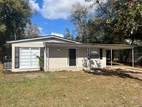 Photo of 1539 Hialeah Street, Orlando, FL 32808 (MLS # O6388356)