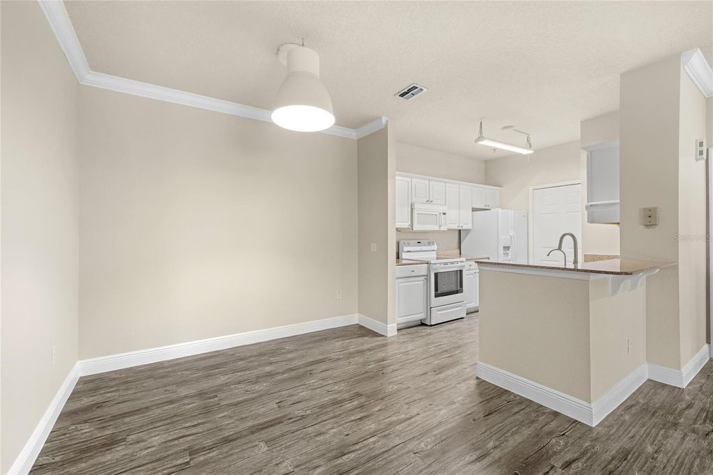Photo of 431 Southern Pecan Circle #201, Winter Garden, FL 34787 (MLS # O6397663)