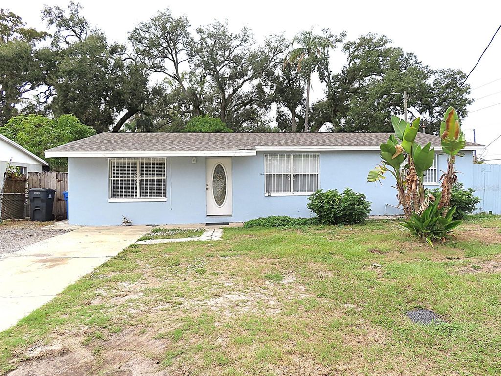 Photo of 3908 Beechwood Boulevard, Tampa, FL 33619 (MLS # TB8455932)