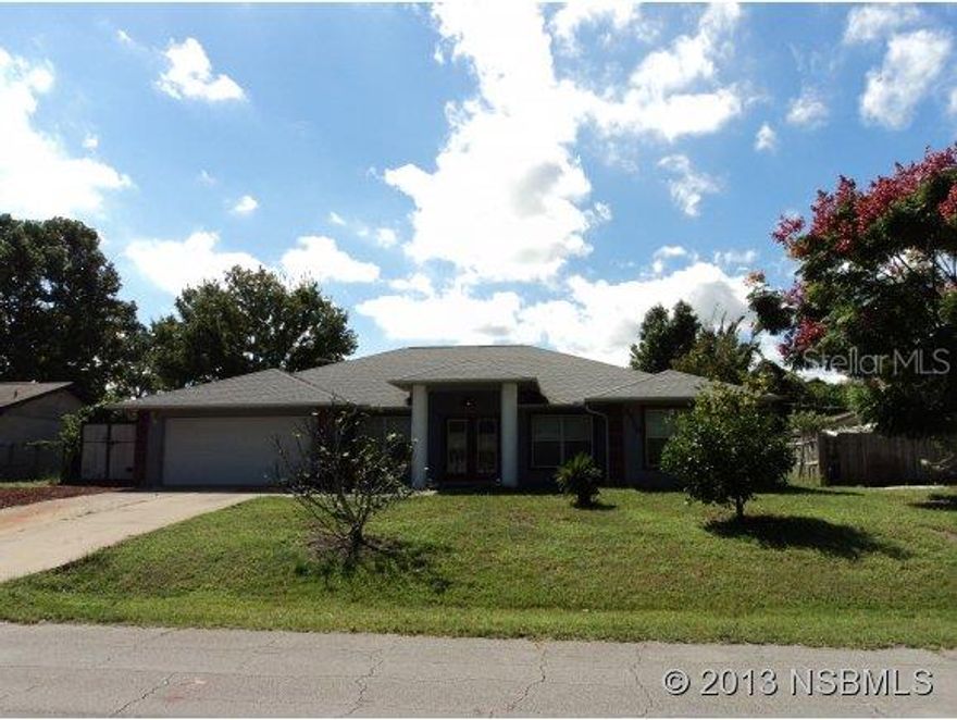 LARGE ONE OWNER CUSTOM BUILT WILLIE WOOD BLOCK HOME WITH IN-LAW QUARTERS AND 4 BEDROOMS/ 3 FULL BATHS, FORMAL LIVING AND DINING ROOMS AND SPACIOUS KITCHEN WITH EXTRA CABINETS AND COUNTER TOPS TO ACCOMMODATE EVEN THE GOURMET COOK. LARGE SPLIT BEDROOMS ALLOW FOR PRIVACY WITH TWO MASTER SUITES, ONE WITH LARGE GARDEN TUB WITH MANY JETS, WALK IN SHOWER SURROUNDED BY GLASS BLOCKS.STEEL REINFORCED TUBS IN OTHER BATHS.LARGE SCREENED PORCH TO ENJOY THE LUSH BACKYARD. THE HOME SITS HIGH AND DRY IN QUIET AREA OF FLORIDA SHORES YET MINUTES TO I95 AND US #1DOUBLE LOT HIGH & DRY ;Water: City