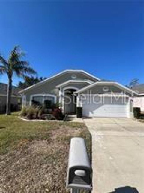 Photo of 333 Garberia Drive, Davenport, FL 33837 (MLS # S5141164)
