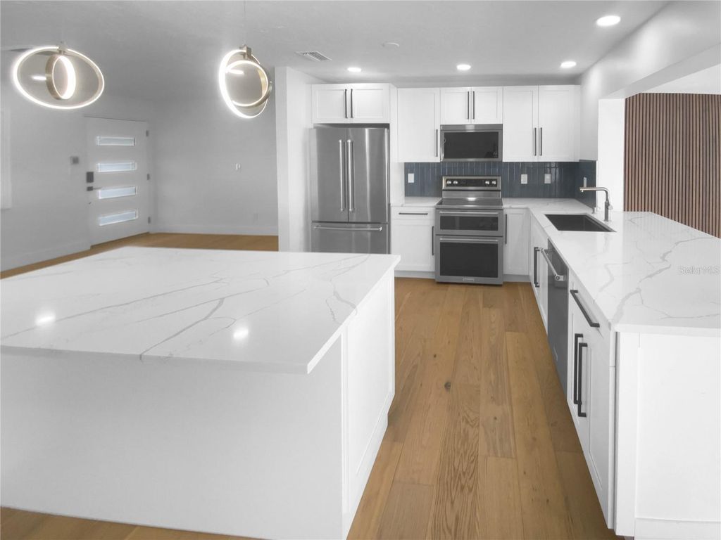 Photo of 8001 13th Avenue S, St Petersburg, FL 33701 (MLS # O6371501)